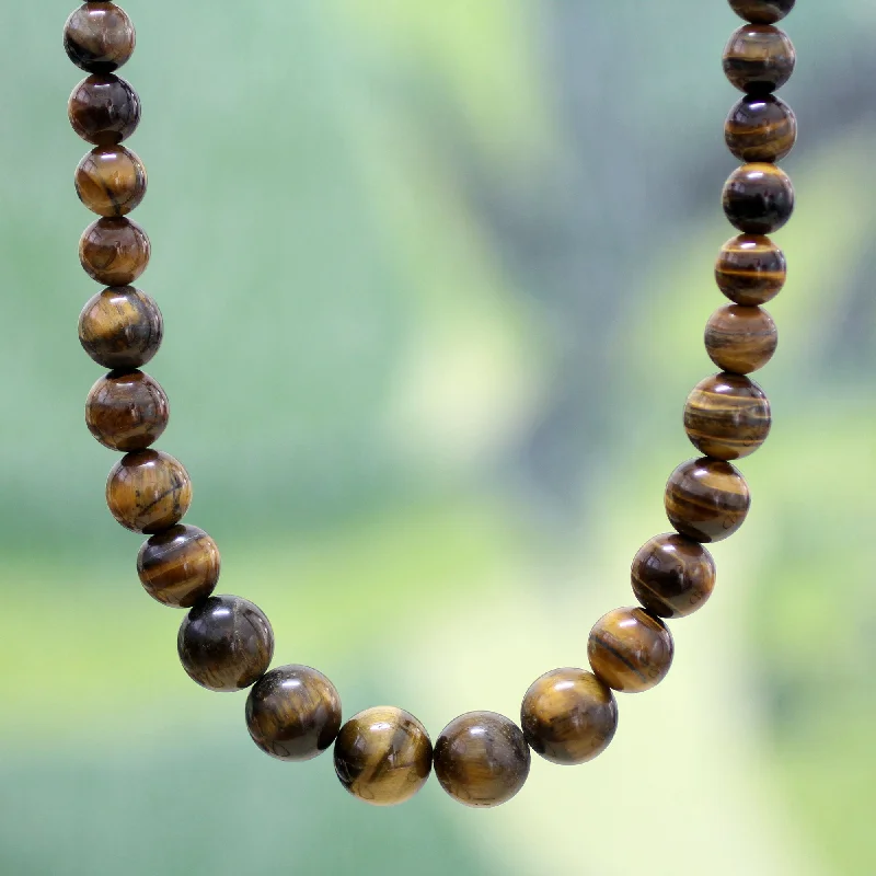 - Organic cotton dog bibsGolden Light Tiger's eye beaded necklace