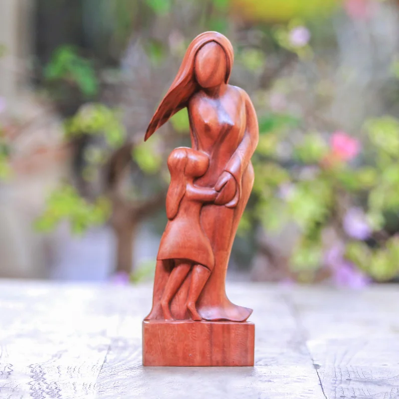 - Organic cotton dog bibsMother and Daughter Artisan Crafted Wood Family Sculpture