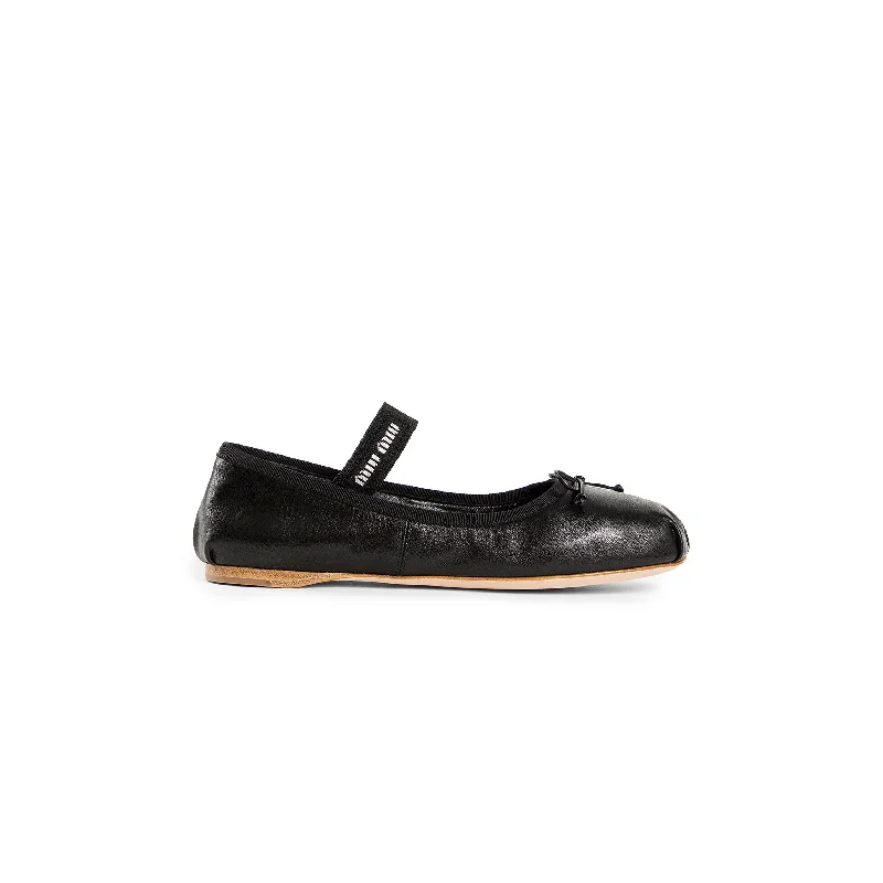 MIU MIU WOMAN BLACK FLATS